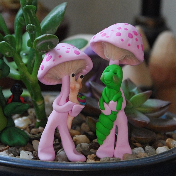 Sculpted clay little pink Felted Twiglet Shrooms with their snail and ladybug friends for your fairy garden