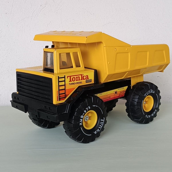 Mighty Tonka Turbo-Diesel Truck XMB-975 , dump body, vintage toy truck , pressed steel , plastic , yellow and black