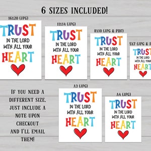 May include: Six printable designs of a rainbow-colored text graphic that says "Trust in the Lord with all your heart" with a red heart underneath. The designs are in different sizes, including 16x20, 11x14, 8x10, 5x7, A3, and A4.