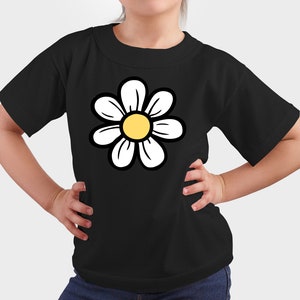 May include: A black t-shirt featuring a white daisy graphic. The daisy has a yellow centre.