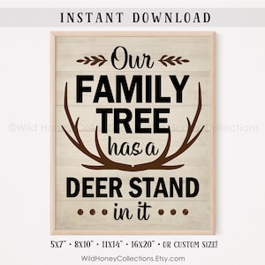 May include: A framed wooden sign with the text "Our FAMILY TREE has a DEER STAND in it" in black lettering. The sign has a light wood background with brown deer antlers and leaf accents. Sizes available: 12.7x17.8cm, 20.3x25.4cm, 27.9x35.6cm, 40.6x50.8cm.