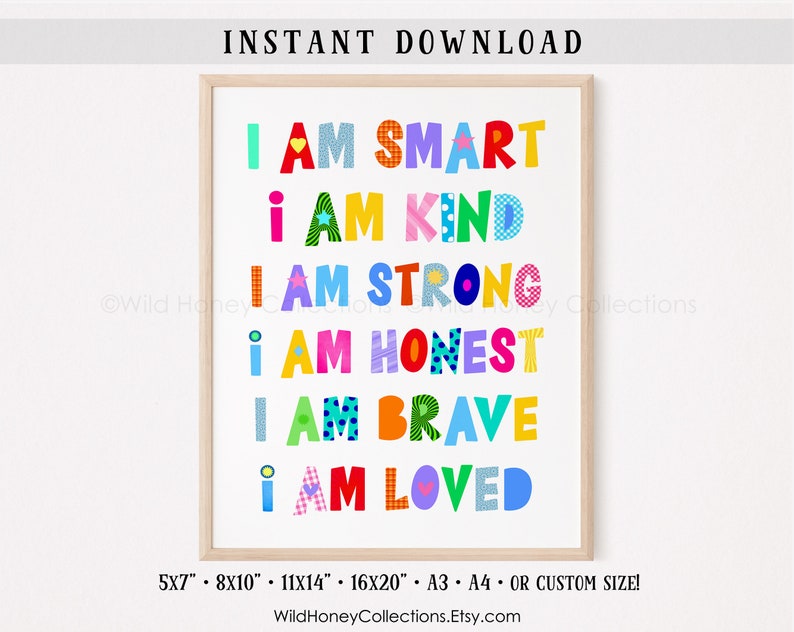 May include: Colorful printable wall art with the text "I am smart, I am kind, I am strong, I am honest, I am brave, I am loved". The text is in a variety of colors and fonts, and each letter is decorated with a different pattern. The art is framed in a light wood frame.