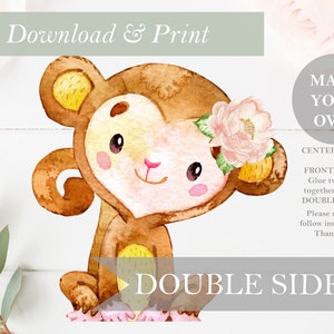 May include: A printable, double-sided, watercolor illustration of a cute monkey wearing a pink flower. The monkey is sitting down with its arms crossed. The text "Download & Print" and "Make Your Own Centerpieces!" is visible in the image.