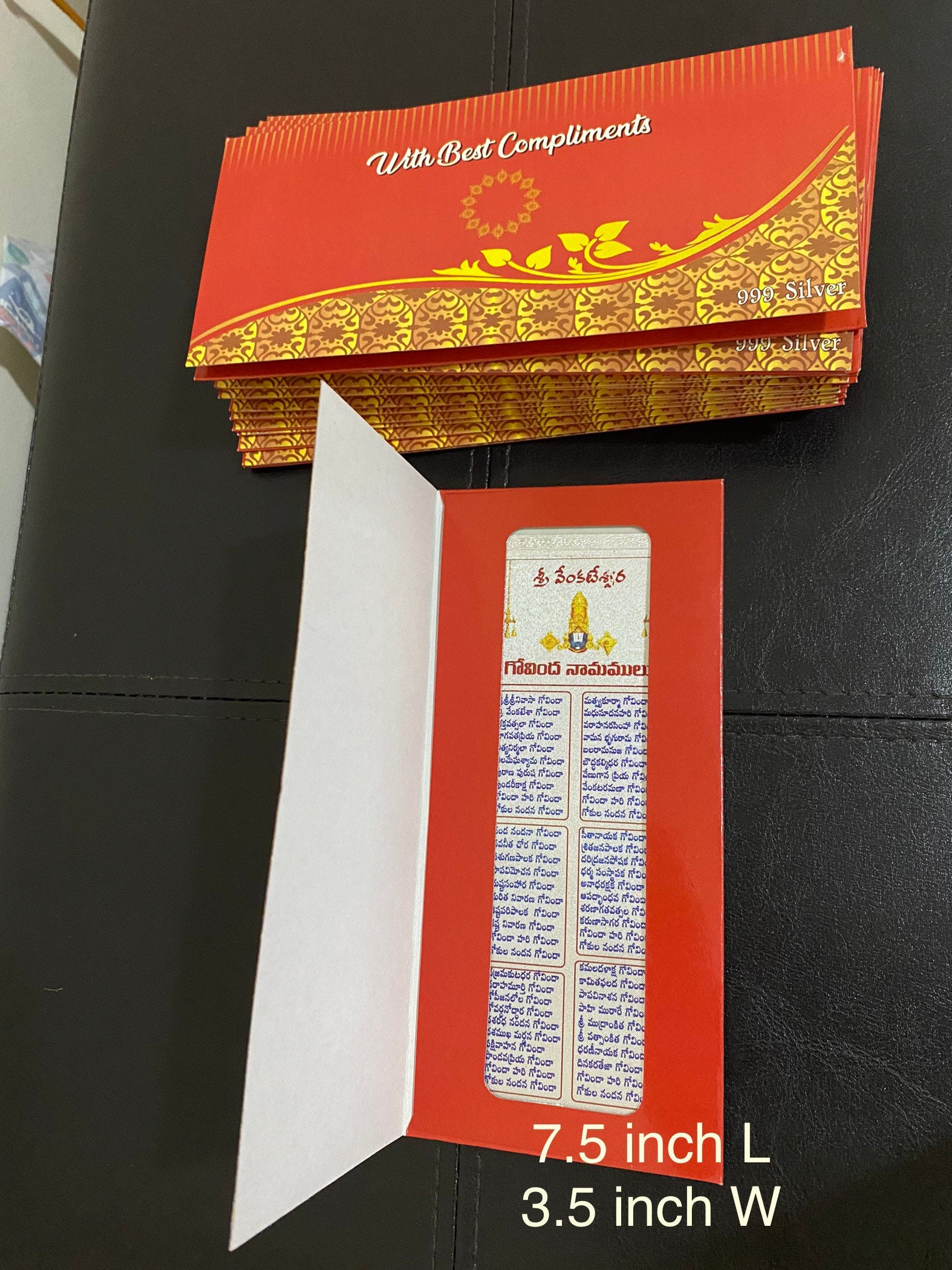 Silver card govinda namalu. Govinda Namalu on sliver card with envelope.