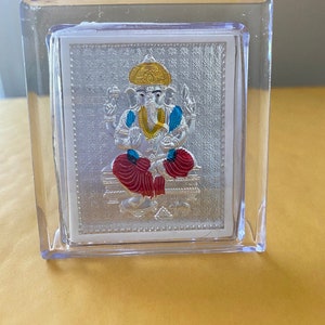 Pure Silver Lord Vinayaka frames with enamel. Budget friendly pure silver gift ideas. Pure silver god frames. Puja decors. Small size.