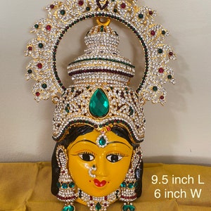 Goddess Vara Maha Lakshmi Devi face idol. Premium quality shiney stone studded lakshmi face idol for puja. Sravanamasam n diwali puja idols.