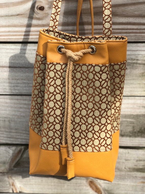 mustard yellow bucket bag