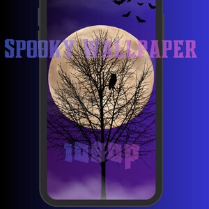May include: A digital wallpaper design featuring a full moon behind a bare tree with a perched bird. Silhouetted bats fly across a purple sky. The words "Spooky Wallpaper" are displayed on the screen.