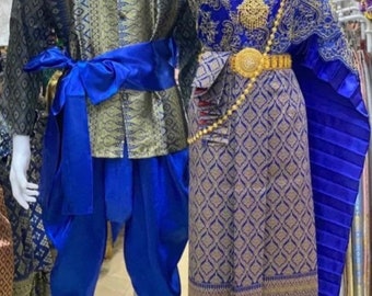May include: A blue and gold patterned traditional Thai outfit with a blue sash and a gold belt. The outfit is on a mannequin. The text "D3" is visible in the upper right corner of the image.