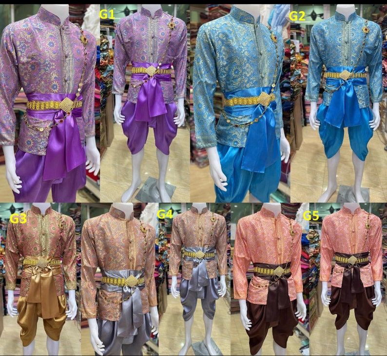May include: Five different traditional Thai outfits with gold trim and patterned fabric. Each outfit includes a long-sleeved shirt, pants, and a sash with a gold buckle. The outfits are displayed on mannequins.