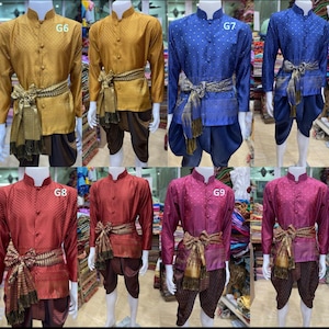 May include: Four mannequins are wearing traditional Thai clothing. The clothing is in four different colors: gold, blue, red, and pink. Each outfit includes a long-sleeved shirt with a mandarin collar and a pair of pants. The shirts have a small patterned design. The pants are a solid color and have a sash tied around the waist. The mannequins are standing on a white background. The text "G6", "G7", "G8", and "G9" is visible on the shirts.