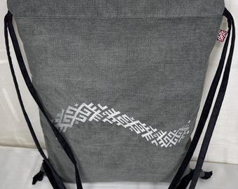 Handmade backpack with Latvia sign