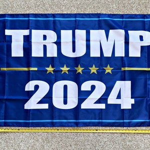 Donald Trump Bandera ENVÍO GRATIS Don Jr 2024 Ivanka Azul Estrellas Amarillas Veteranos EE.UU. Cartel de signo 3x5'