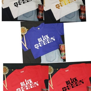 May include: Four t-shirts in different colors, white, blue, red, and gold, with the text "Black Queen" and the phrase "The most sought after piece in the game" printed on them.