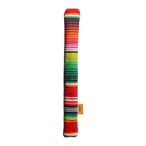 May include: A colorful, woven golf club head cover with a striped pattern in red, orange, yellow, green, and black. The cover has a rectangular shape and a small, orange tag attached to the side.