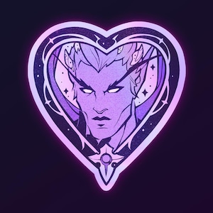 May include: Three heart-shaped stickers featuring a stylized male face with pointed ears and a stern expression. The design is in shades of purple and white, with a celestial theme. The stickers have a dark background.