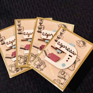 May include: Four gold-trimmed cards with a beige background featuring a vintage illustration of an espresso machine and the word "espresso" in brown cursive writing.