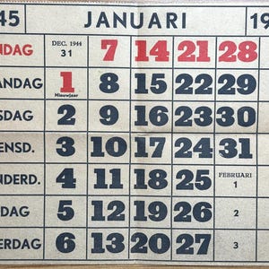 May include: A vintage January 1945 calendar page. The calendar grid is printed in black ink on a beige paper. The days of the week are listed in Dutch. The numbers 7, 14, 21, and 28 are in red.
