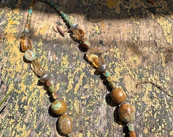 Vintage turquoise stone necklace with sterling silver accents—earthy, bold, and full of timeless Southwestern character.
