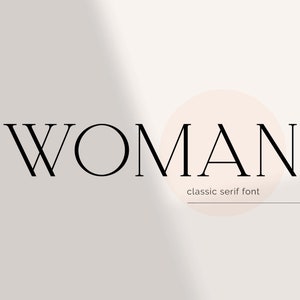 May include: A black and white graphic design of the word "WOMAN" in a classic serif font.