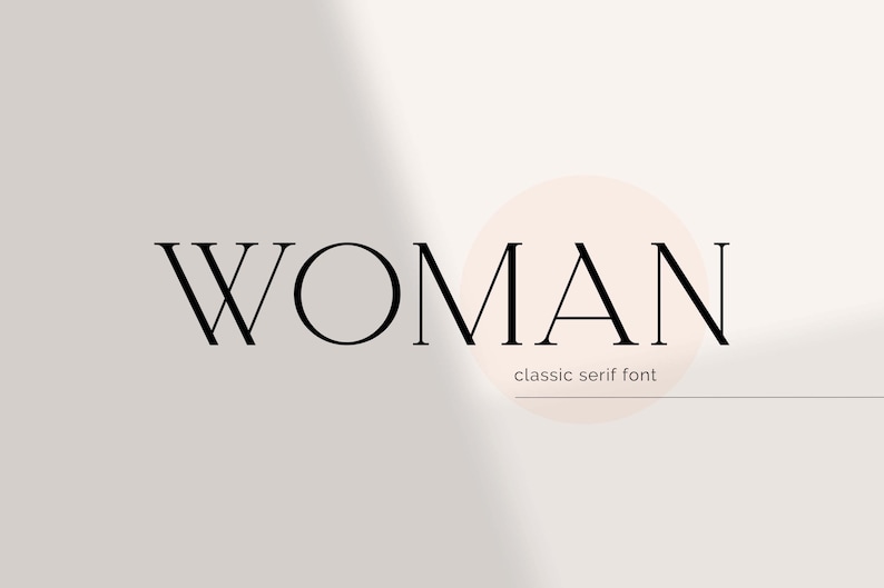 May include: A black and white graphic design of the word "WOMAN" in a classic serif font.