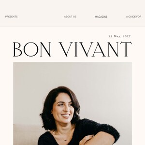 May include: A woman with dark hair and a black sweater smiles at the camera. The text "BON VIVANT" is above her in a black sans-serif font. The date "22 May, 2022" is above the text.