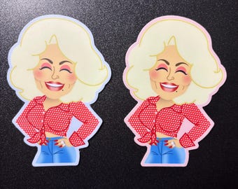 May include: Two die-cut stickers featuring a cartoon illustration of a person with voluminous blonde hair, a red polka-dot button-down shirt tied at the waist, and blue jeans. One sticker has a light blue border, and the other has a light pink border.