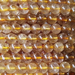 4mm-12mm Natural Golden Rutile Quartz Smooth Round Beads, Golden Rutilated Quartz beads wholesale supply.15" strand