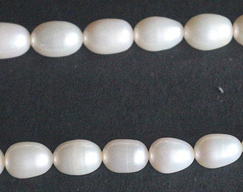 Natural Freshwater Pearls oval beads,14.5 inch strands, 6~7 mm