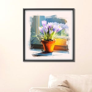 May include: A framed painting of a terracotta pot filled with purple crocus flowers. The pot sits on a windowsill, with sunlight illuminating the flowers and the window frame. The painting has a soft, impressionistic style.