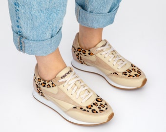 c116 low top sneaker