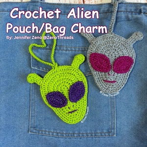 May include: Two crocheted alien pouch or bag charms. One is green with purple eyes and the other is gray with pink eyes. Both have a loop for hanging.