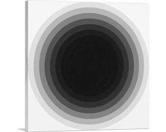 May include: Abstract black and white concentric circles artwork. The circles are arranged in a gradient pattern, with the darkest circle in the center and the lightest circles on the outside.