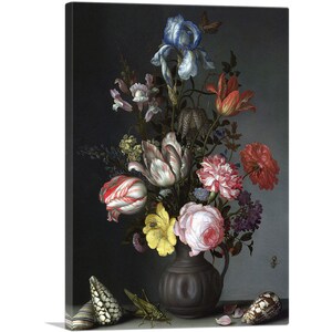 May include: A still life painting of a bouquet of flowers in a dark gray vase. The flowers include tulips, irises, roses, and carnations in shades of red, pink, white, blue, and yellow. The vase is decorated with a floral pattern. There are two seashells and a grasshopper on the table below the vase.