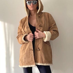 Veste vintage en peau de mouton retournée en daim à bascule