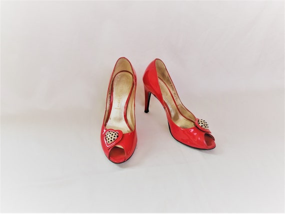 Casadei peep cheap toe pumps
