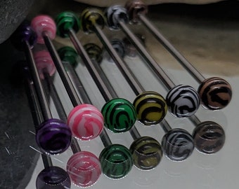 May include: A set of ten colorful barbell earrings with different patterns. The earrings are made of stainless steel and have a variety of colors, including pink, green, black, and white.