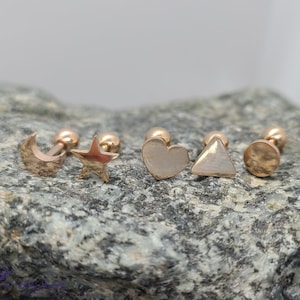 Kraakbeenhalter met gemengde vormen - roségoud - hart-, ster-, halvemaan-, rond- en driehoekvorm