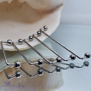 vibrating tongue ring for snake eyes Snake eyes tongue piercing, what to expect and proper aftercare main image 1
