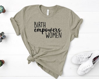 May include: A light green t-shirt with the text "Birth empowers women" in black lettering.