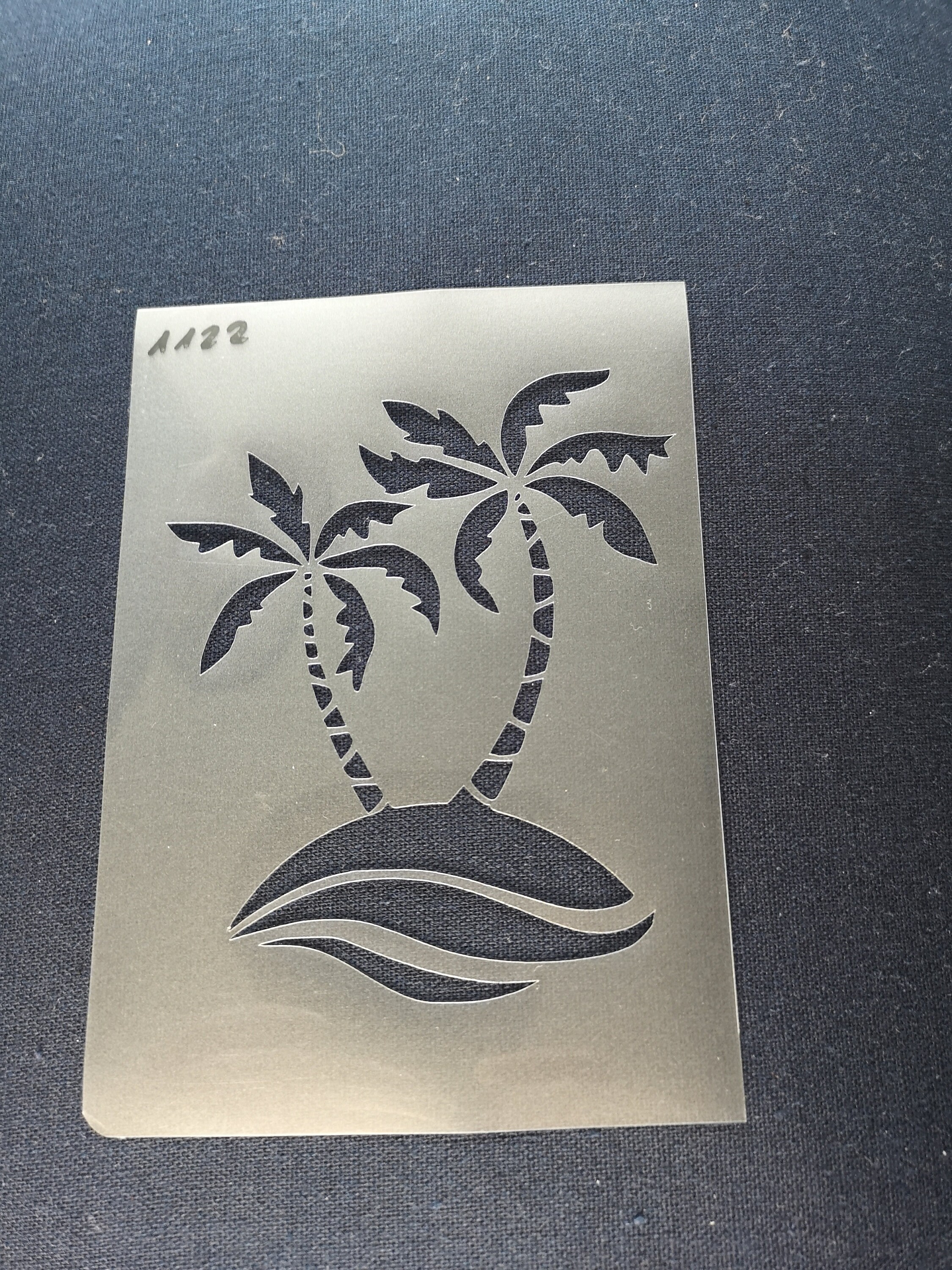 Flexible palm tree stencil, perfect for walls.