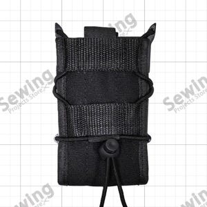 May include: A black tactical magazine pouch constructed from durable nylon webbing. The rectangular pouch features a vertical orientation with an adjustable elastic shock cord retention system and a plastic cord lock at the bottom for securing items.