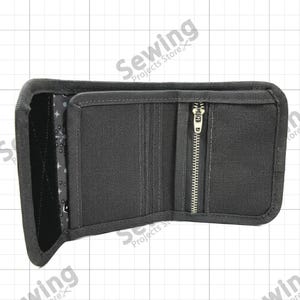 May include: A black tri-fold wallet featuring a vertical zippered compartment, multiple card slots, and a dark interior lining with a subtle star pattern. The wallet is constructed from a durable fabric with reinforced stitched edges.