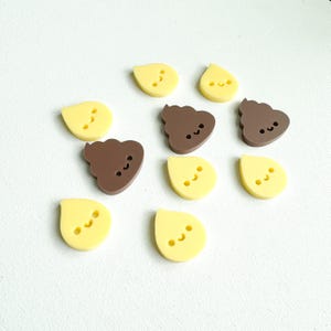 May include: A set of ten small, colorful, plastic figurines. The figurines are shaped like a drop of water and a pile of poop. Each figurine has a cute, cartoon face.