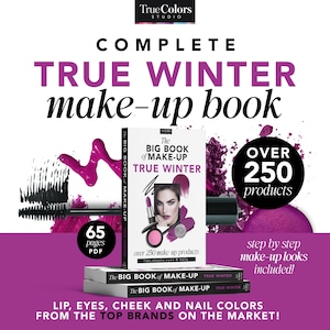 May include: A pink and purple makeup book titled "The Big Book of Make-Up True Winter" with a woman's face on the cover. The book is open to a page that says "over 250 make-up products" and lists lip, cheeks, eyes, and nails. The book is surrounded by makeup products, including a mascara wand, lipstick, and a blush compact.