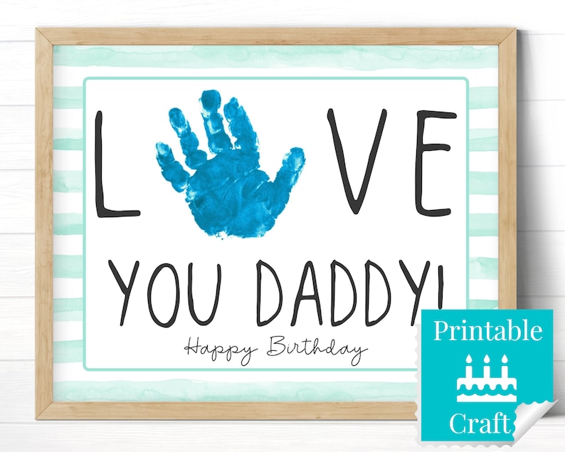 May include: Printable craft for Father's Day or a birthday. A blue handprint with the words "LOVE YOU DADDY!" and "Happy Birthday" on a white background with light blue stripes.