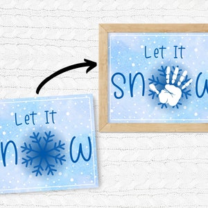 May include: A blue and white watercolor print with the text "Let It Snow" and a snowflake with a white handprint in the center.
