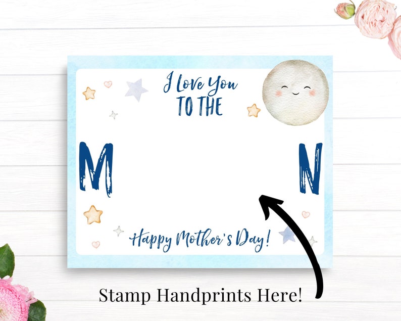 May include: A blue and white card with the text "I love you to the moon" and a smiling moon face. The card has a space for handprints and the text "Happy Mother's Day!"