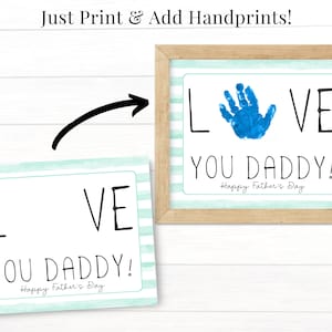 May include: Printable Father's Day card with the words "LOVE YOU DADDY!" and a space for a handprint. The card has a light blue and white striped background.