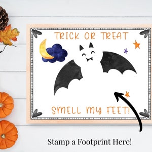 May include: A printable Halloween sign featuring a bat, moon, and stars. The sign reads "Trick or Treat Smell My Feet!" and has a space for a footprint.